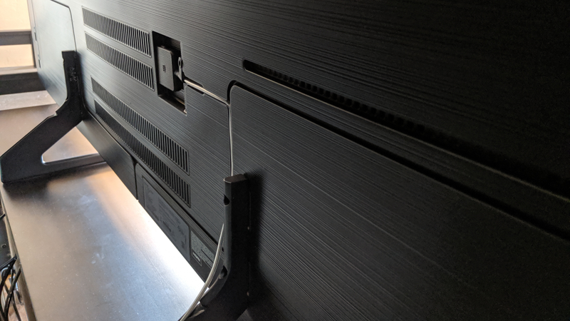All of Samsung’s top-tier TVs run a single, thin optical cable to an external HDMI box to keep things looking clean.
